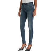 Armani Exchange Damen-Jeans aus blauem Stretch-Denim, hochgeschnitten, schmal geschnitten, mittelblaue Waschung mit dezenten Auswaschungen und Used-Effekten