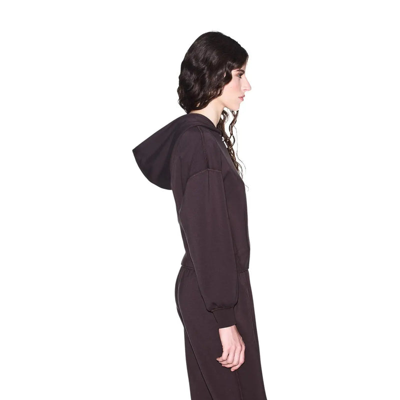 Black hooded jumpsuit with long sleeves and relaxed fit displayed with Armani Exchange women brown zip hooded sweatshirt