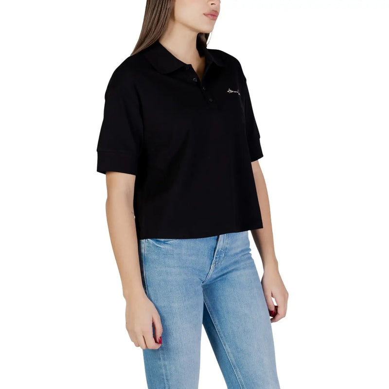 Armani Exchange Schwarzes, kurzärmeliges Poloshirt aus Baumwolle für Damen mit dezentem, weißem, gesticktem Logo auf der linken Brustseite.