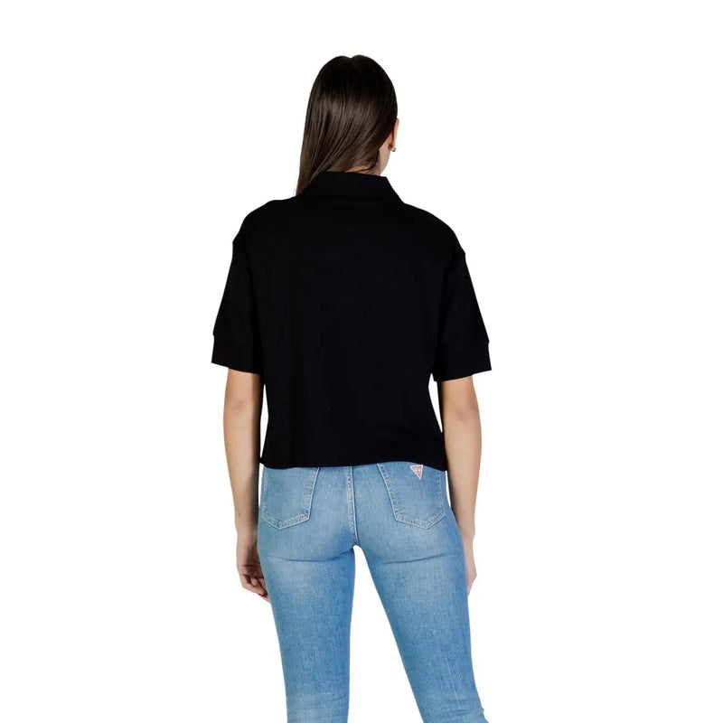Armani Exchange Schwarzes Damen-Poloshirt aus Baumwolle mit kurzen Ärmeln, klassischem Kragen und kurzem Saum, Vorderansicht