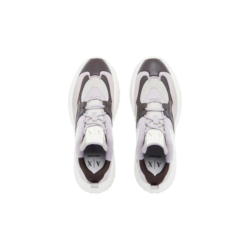Armani Exchange women slip on sneakers feature a chunky design in gray and white polyurethane with black accents