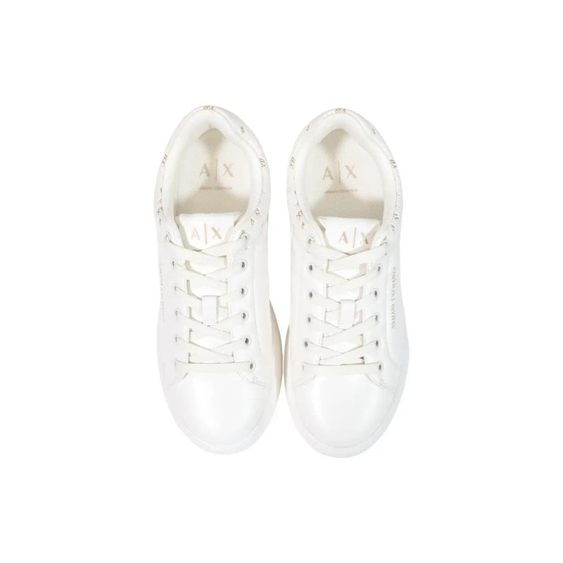 Armani Exchange women slip on sneakers in white polyurethane with subtle gold lettering and branding