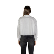Armani Exchange women white cotton long sleeve button shirt featuring a sleek light gray satin blouse style