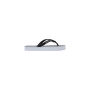 Armani Exchange women white rubber flip flops with black and white straps and a grid-patterned sole