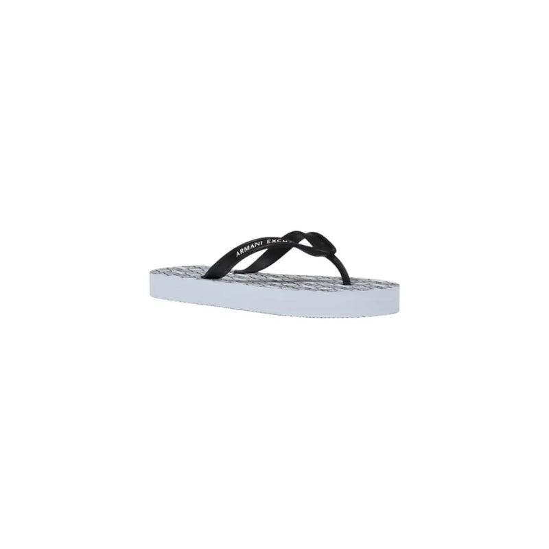 Armani Exchange women white rubber flip flops with black and white textured patterned sole shown from the back side