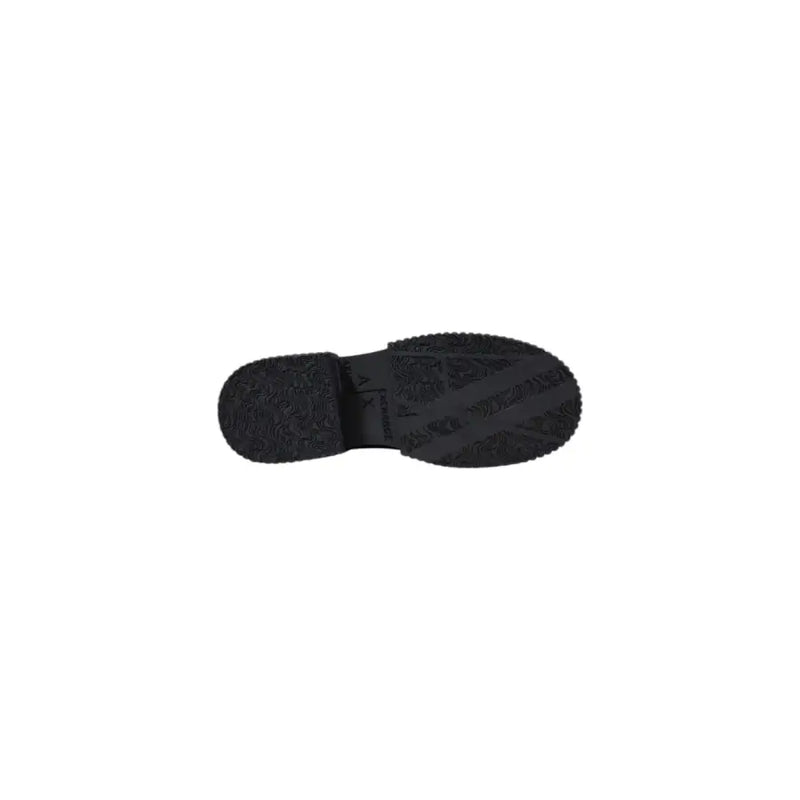 Black rubber sole with textured tread pattern and embossed armani exchange logo on womens leather moccasin slippers