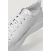 Armani Exchange women’s white leather low-top sneaker with slip-on design and minimalist style