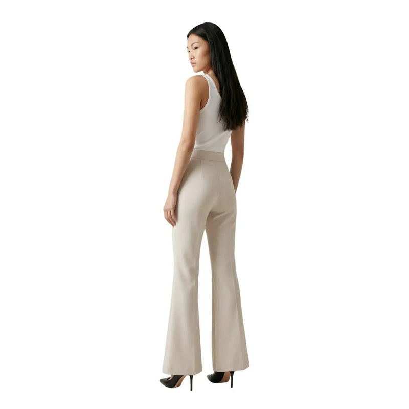 Beigefarbene, hochgeschnittene Schlaghose von Artigli für Damen mit eleganter, taillierter Passform aus Polyester und Elastan, mit Reißverschluss und Knopfverschluss