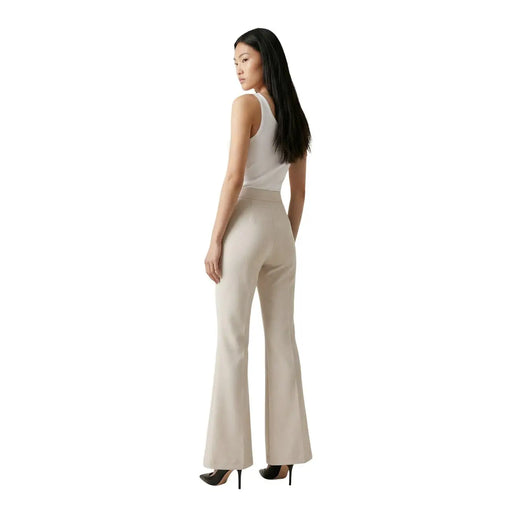 Beigefarbene, hochgeschnittene Schlaghose von Artigli für Damen mit eleganter, taillierter Passform aus Polyester und Elastan, mit Reißverschluss und Knopfverschluss