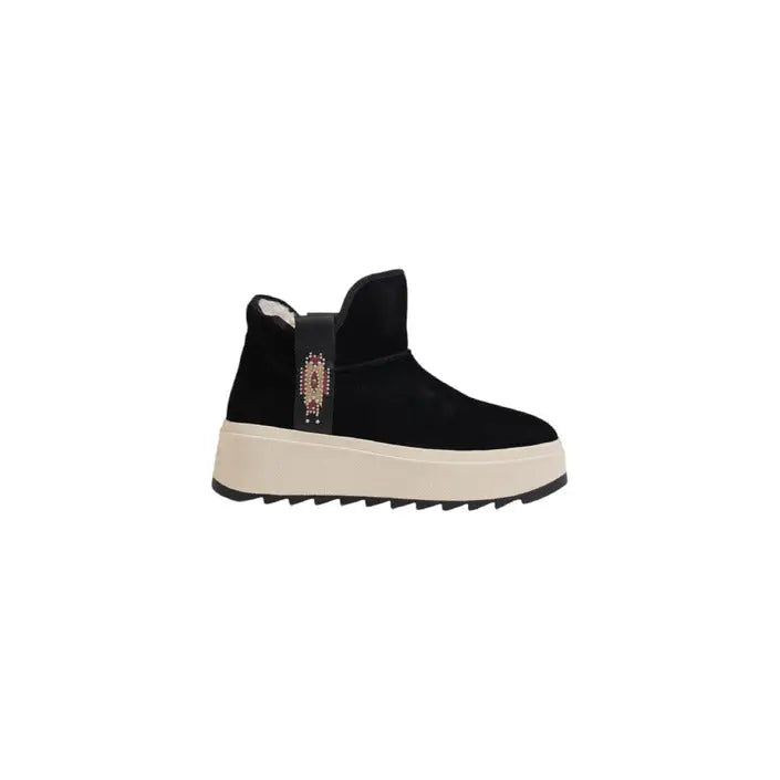 Black suede platform boot displayed with Ash Women’s Camel Leather Slip-On Flats