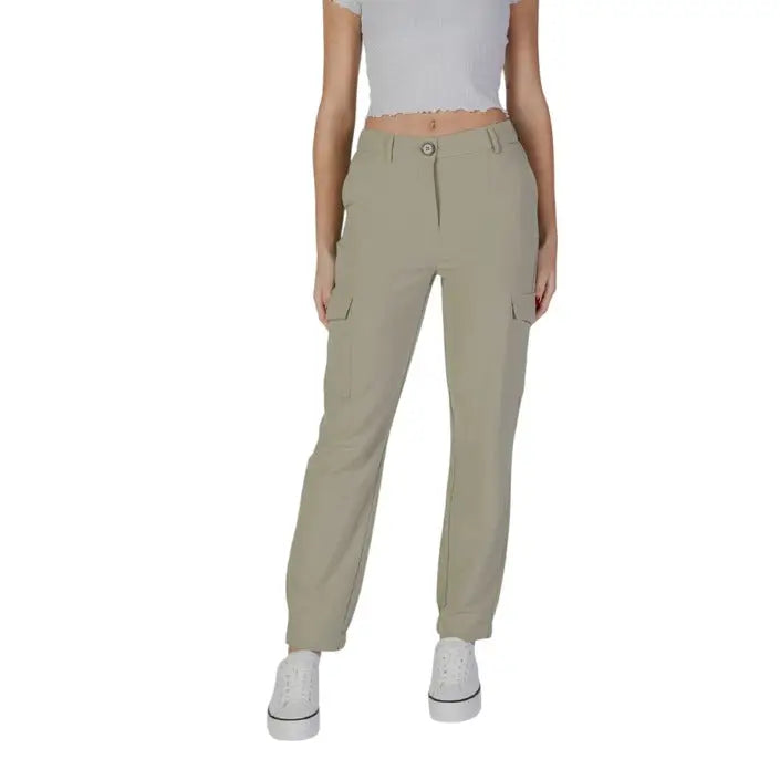 Khaki cargo pants with elastic cuffs styled with white sneakers from B.young