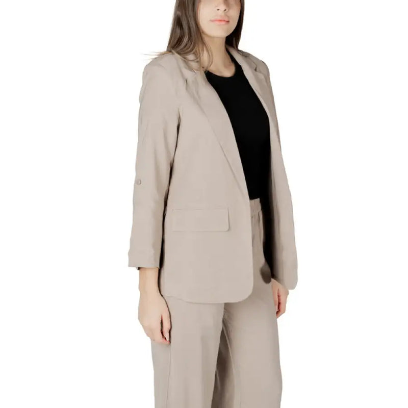 Beige blazer and pants suit displayed in the Beige Blazer and Pants Suit product image