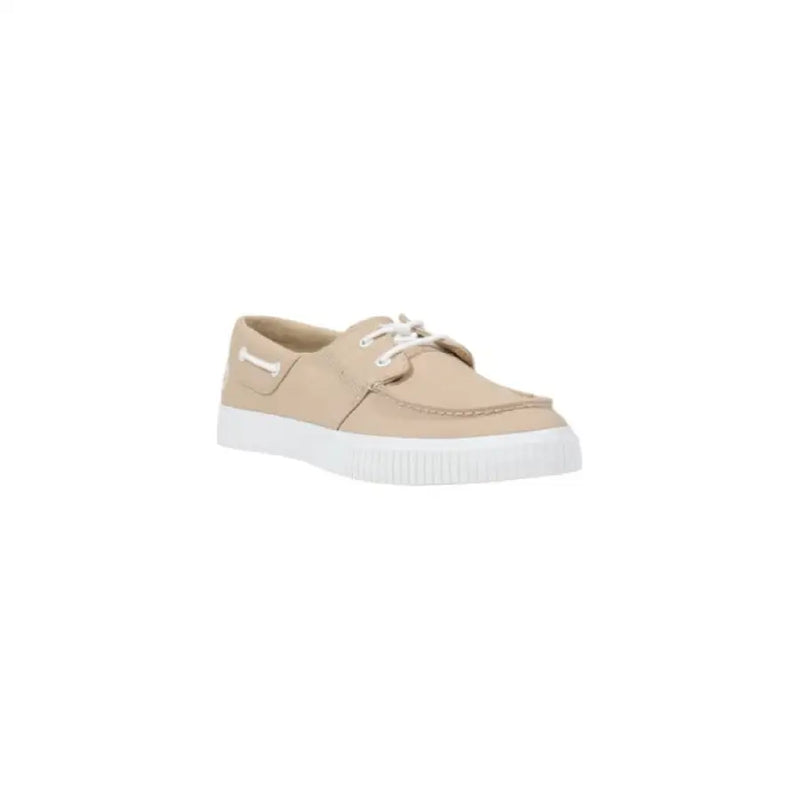 Beige boat shoe with white soles and laces for stylish casual wear