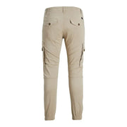 Beige cotton jack and jones mens cargo trousers with elastic cuffs and buttoned back pockets shown from the back side