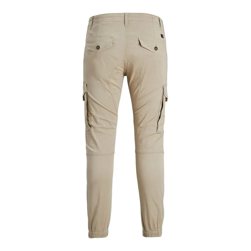 Beige cotton jack and jones mens cargo trousers with elastic cuffs and buttoned back pockets shown from the back side