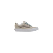 Beige and gray Vans sneaker showcasing casual footwear style and design