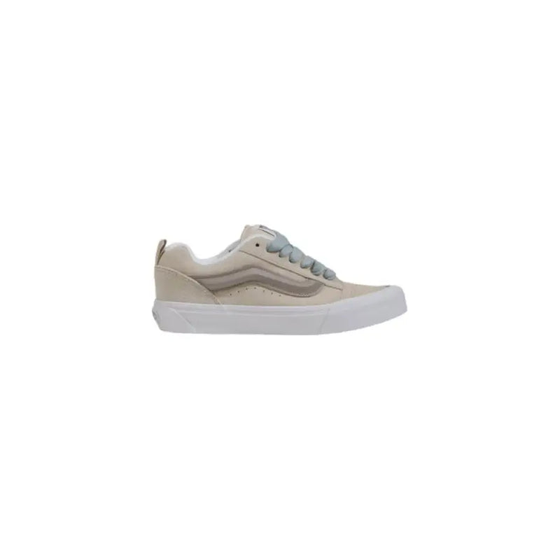 Beige and gray Vans sneaker showcasing casual footwear style and design