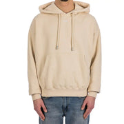 Beige hooded sweatshirt displayed as a product in a retail store