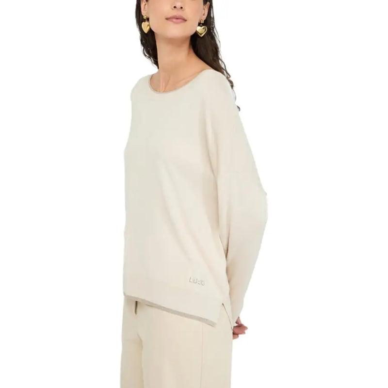 Cream-colored long-sleeve knit sweater with asymmetrical hem for women by Liu Jo