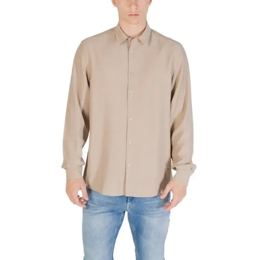Beige long-sleeved shirt from Beige and Tan Long Sleeve Shirts with Blue Jeans collection