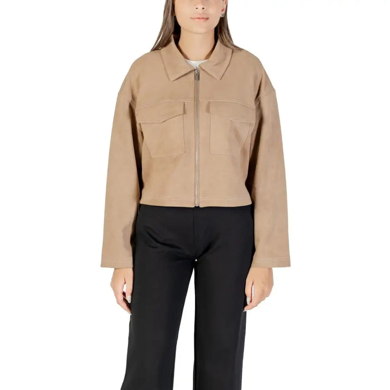 Beige long-sleeved women’s blazer with collar front zipper and chest pockets for fall winter