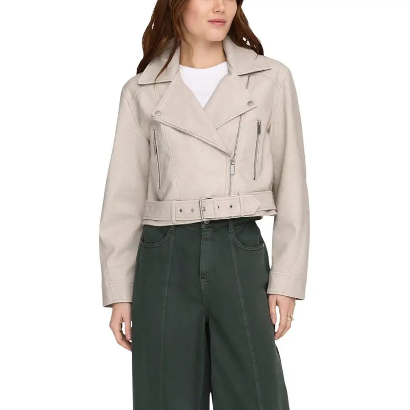 Beige polyester long blazer with v neck featuring a faux leather moto jacket style with silver zippers and matching belt
