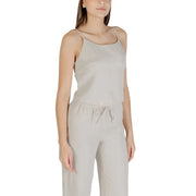 Beige sleeveless round neck polyester top for women with delicate spaghetti straps and a relaxed fit in light gray