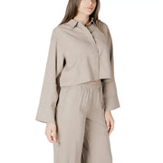 Beige viscose long sleeve round neck blouse for women with cropped button-up design and slightly flared sleeves