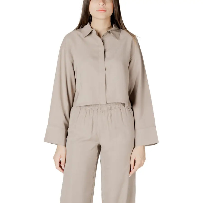 Beige viscose long sleeve round neck blouse for women with relaxed fit button-up design and pleated cuffs