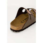Birkenstock women brown leather sandals size 3 with rose gold-toned buckles and cork footbed shown from the back