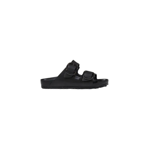 Black birkenstock women slippers with two adjustable straps and contoured footbed made of black rubber