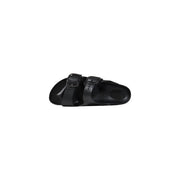 Birkenstock women slippers black rubber with two adjustable straps and a contoured footbed for comfortable wear