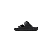 Birkenstock women slippers black rubber with sleek minimalist design and signature black Arizona double-strap closure