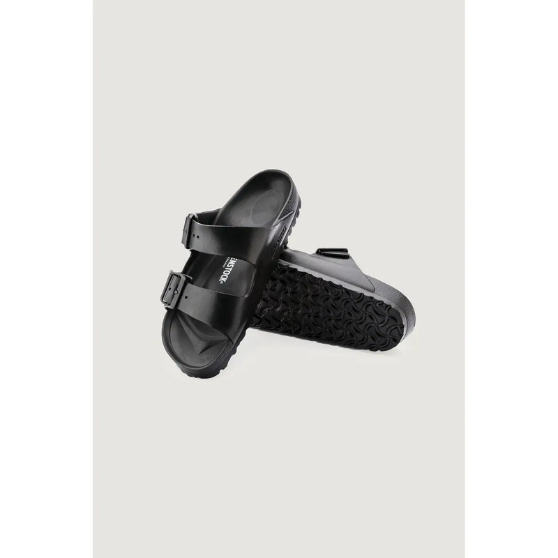 Black birkenstock arizona sandals with glossy finish and two adjustable straps in women’s size 3 slippers