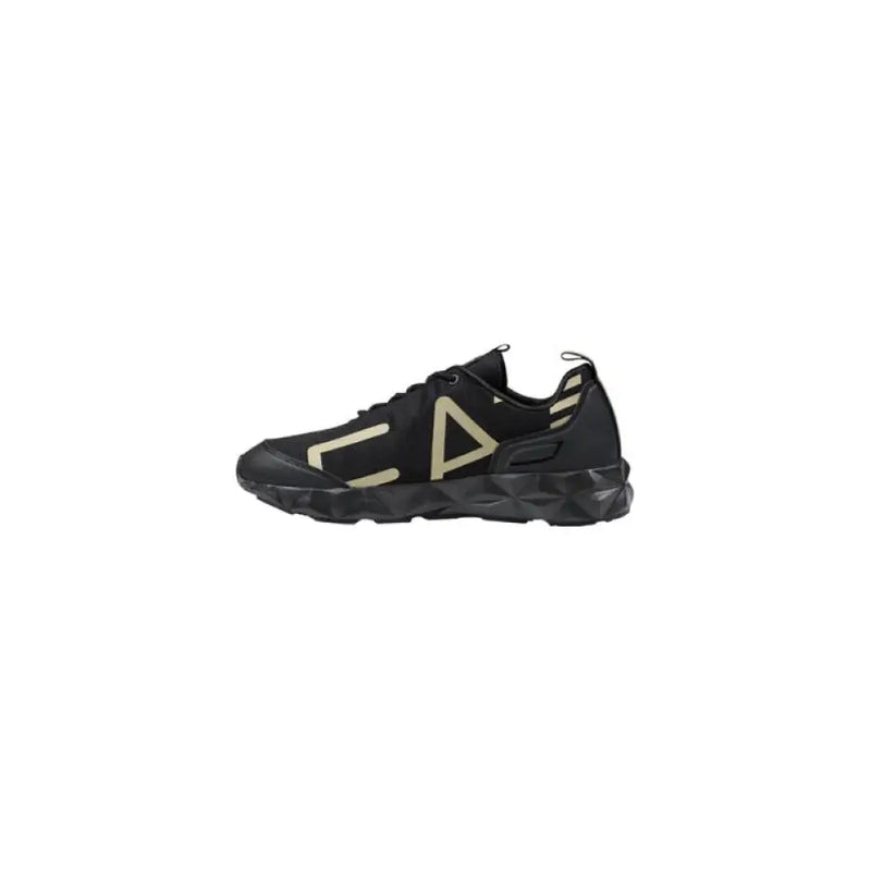 Black and beige athletic shoe featuring geometric accents for sporty style