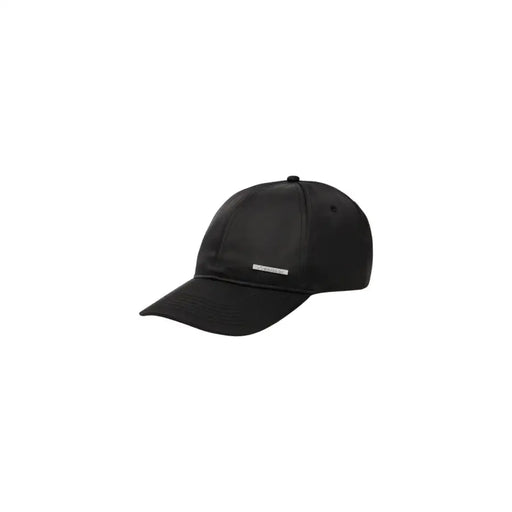 Calvin Klein black baseball cap displayed for fashion and sportswear accessory use