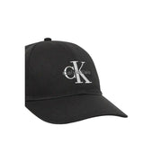 Black Calvin Klein baseball cap displayed prominently in the product listing