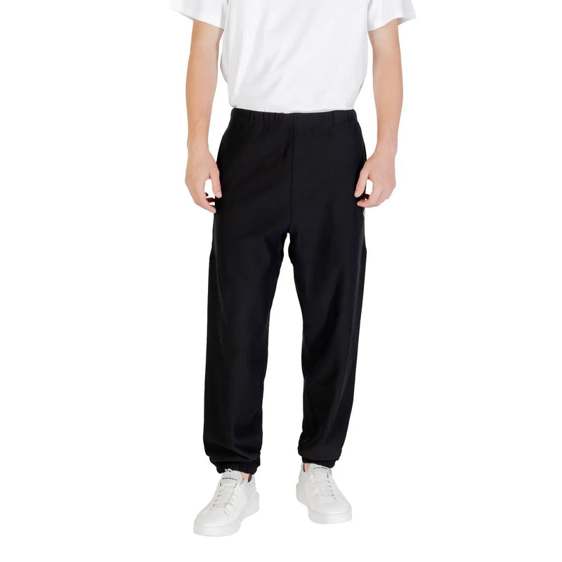 Black Calvin Klein slim-fit jogger pants with elastic cuffs and relaxed silhouette in soft fabric