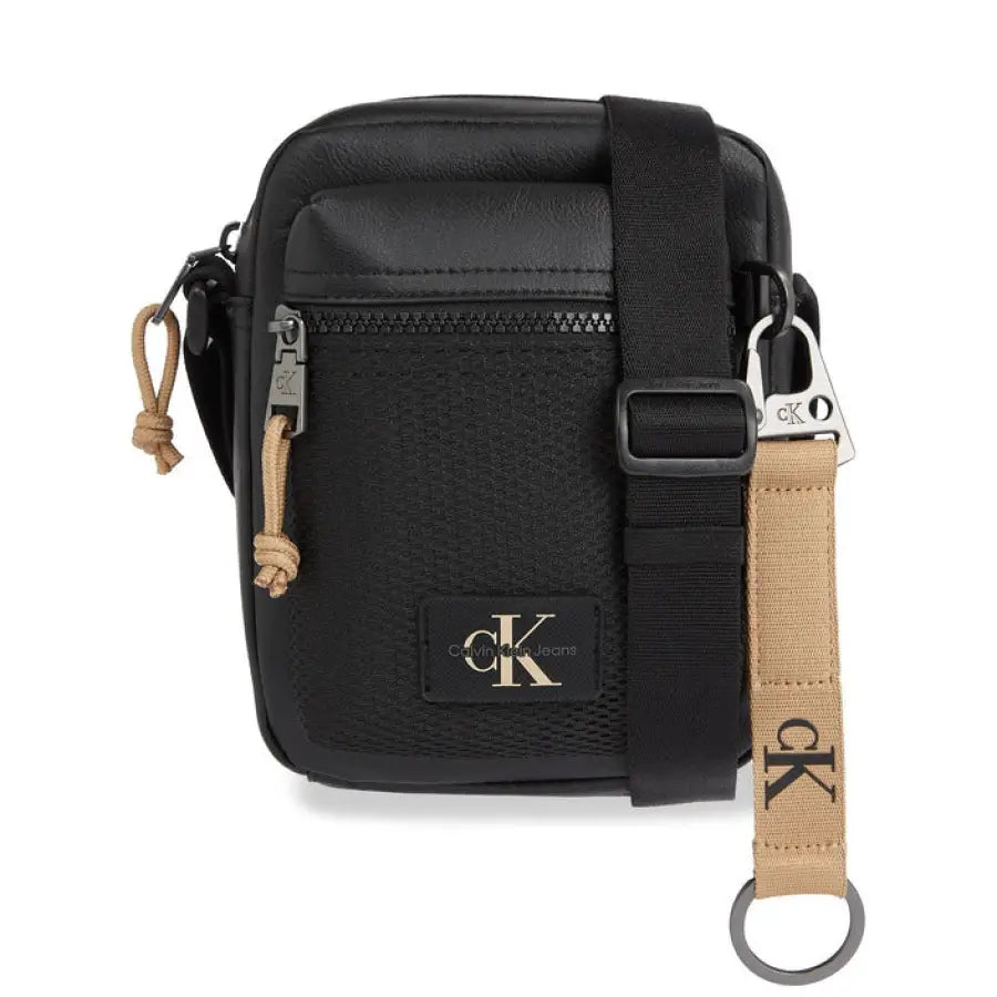 Calvin Klein black camera bag with tan strap for urban style fashion