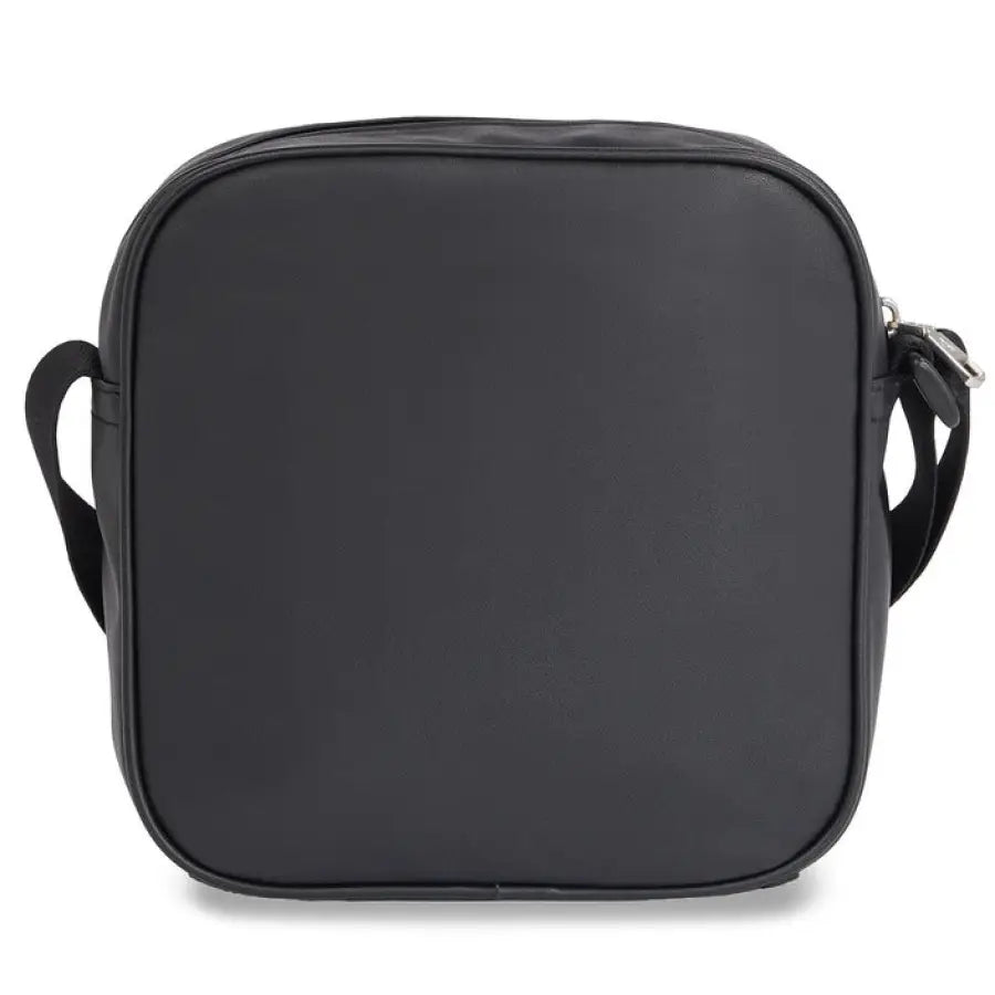 
                      
                        Calvin Klein Men Bag featuring black camera bag in urban city fashion style
                      
                    