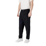 Black athletic cargo pants with multiple storage pockets and a modern design