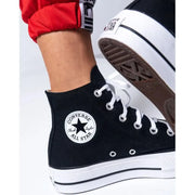 Black Converse platform sneakers featuring print and laces for women