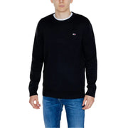 Black long-sleeved crewneck sweater displayed as part of the product listing