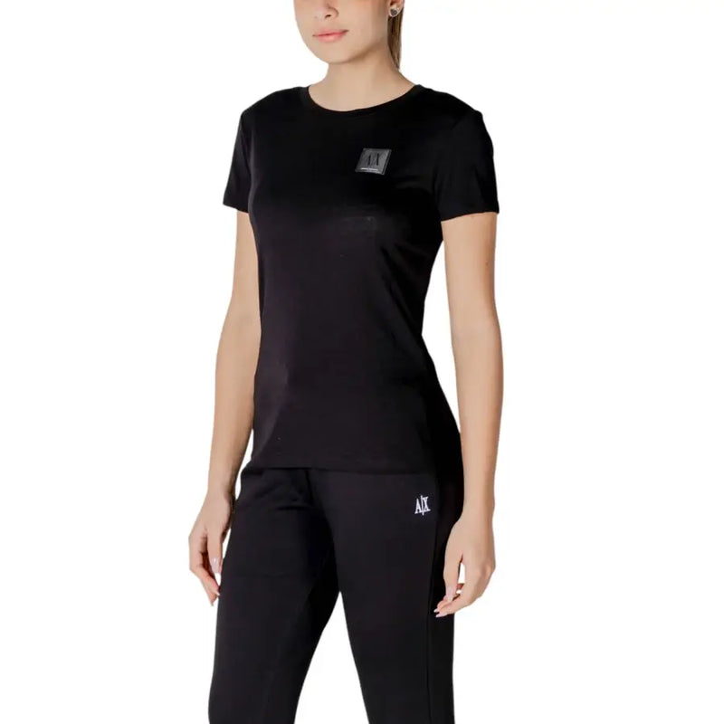 Black armani exchange crewneck t shirt with short sleeves and a subtle logo patch on the chest