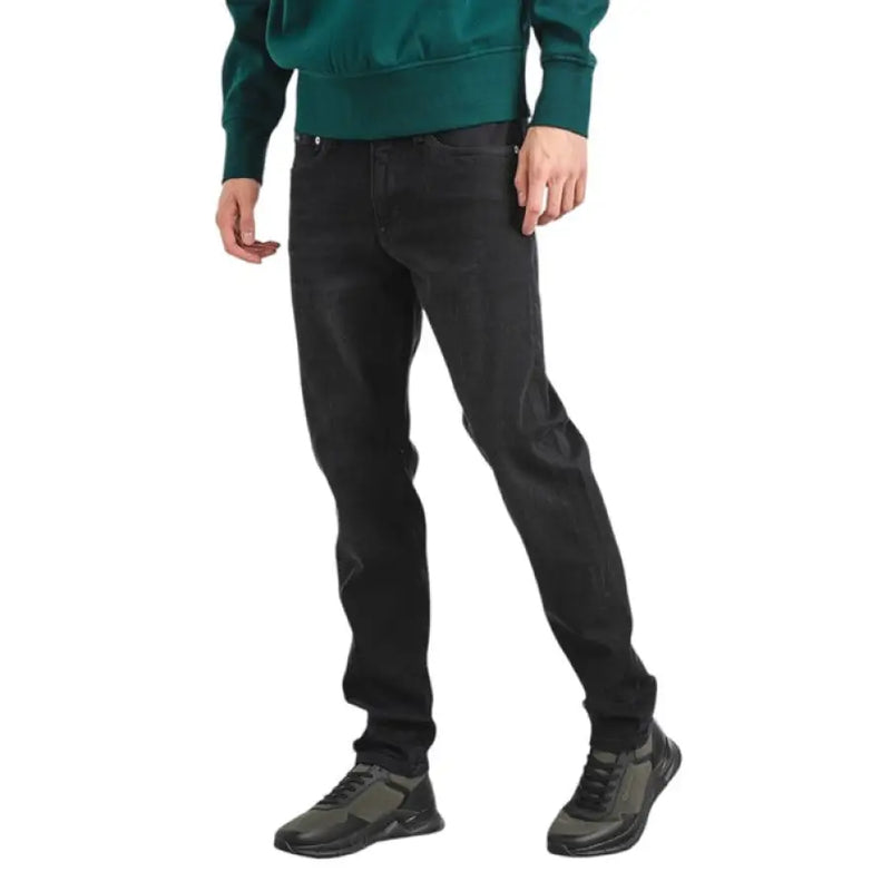 Calvin Klein Men’s Fall Winter Black Denim Jeans showcasing modern style and versatility