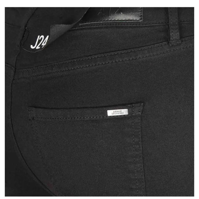 Black Skinny Denim Jeans displayed in a stylish fashion setting