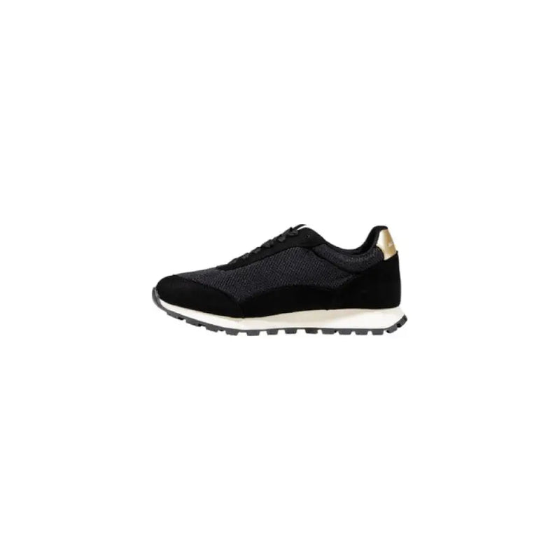 Black and Gold AX Logo Running Shoe showcasing sleek design and premium craftsmanship