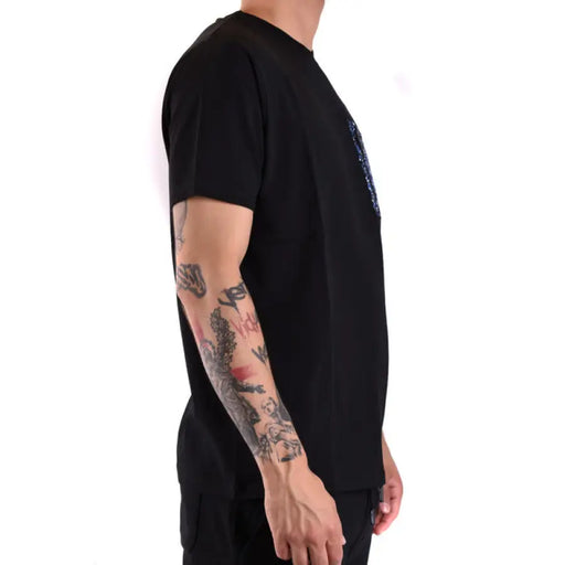Black graphic tee shirt with patterned pocket displayed for product listing