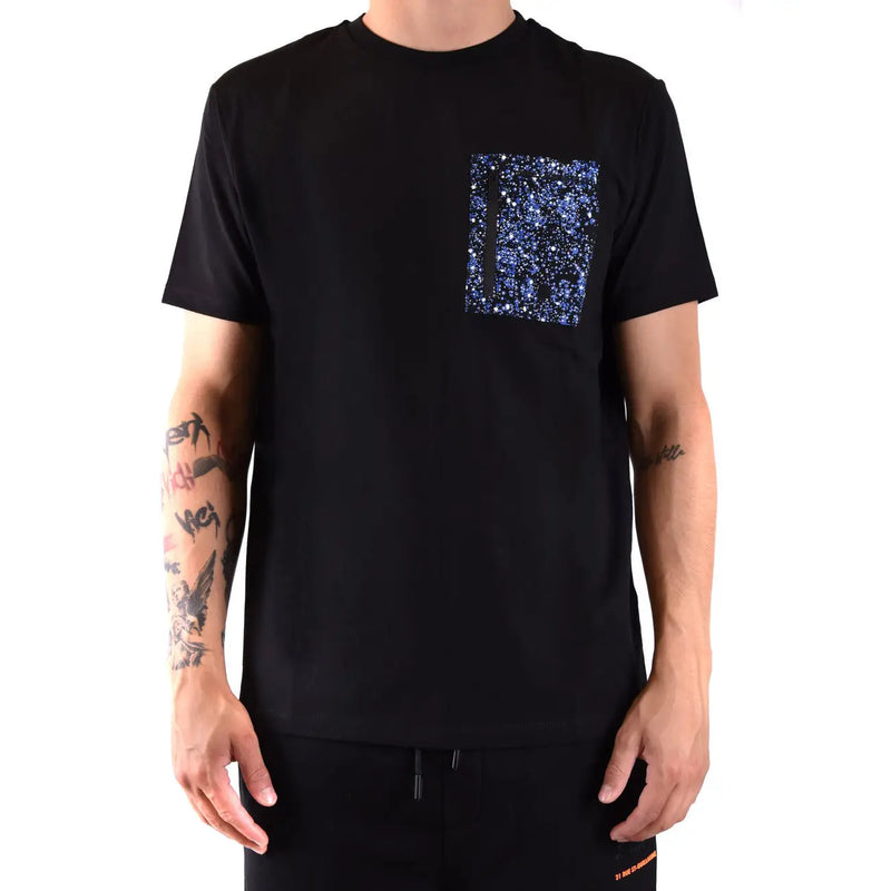 Black graphic tee shirt featuring a glittering blue and silver starry patch on the left chest pocket