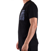 Black short-sleeved graphic tee shirt featuring a sparkling blue sequined patch on the chest pocket